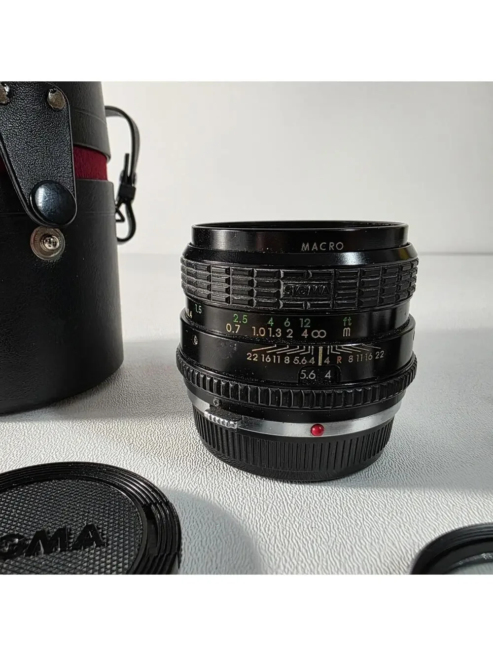 SIGMA 28mm f/ 2.8 lens mini wide, OLYMPUS OM Mount W/Case, Caps & Hood